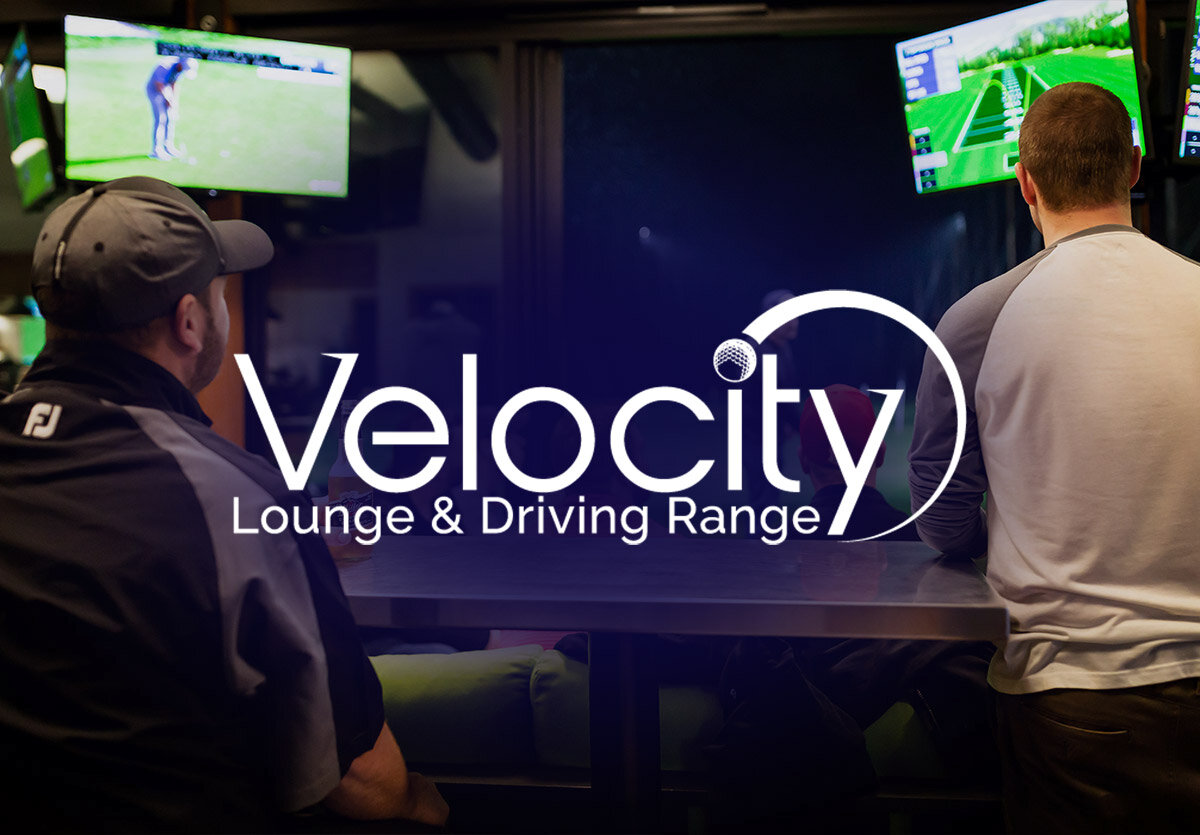 Velocity Lounge and Driving Range logo overtop of an image of specatators watching a golfer on the